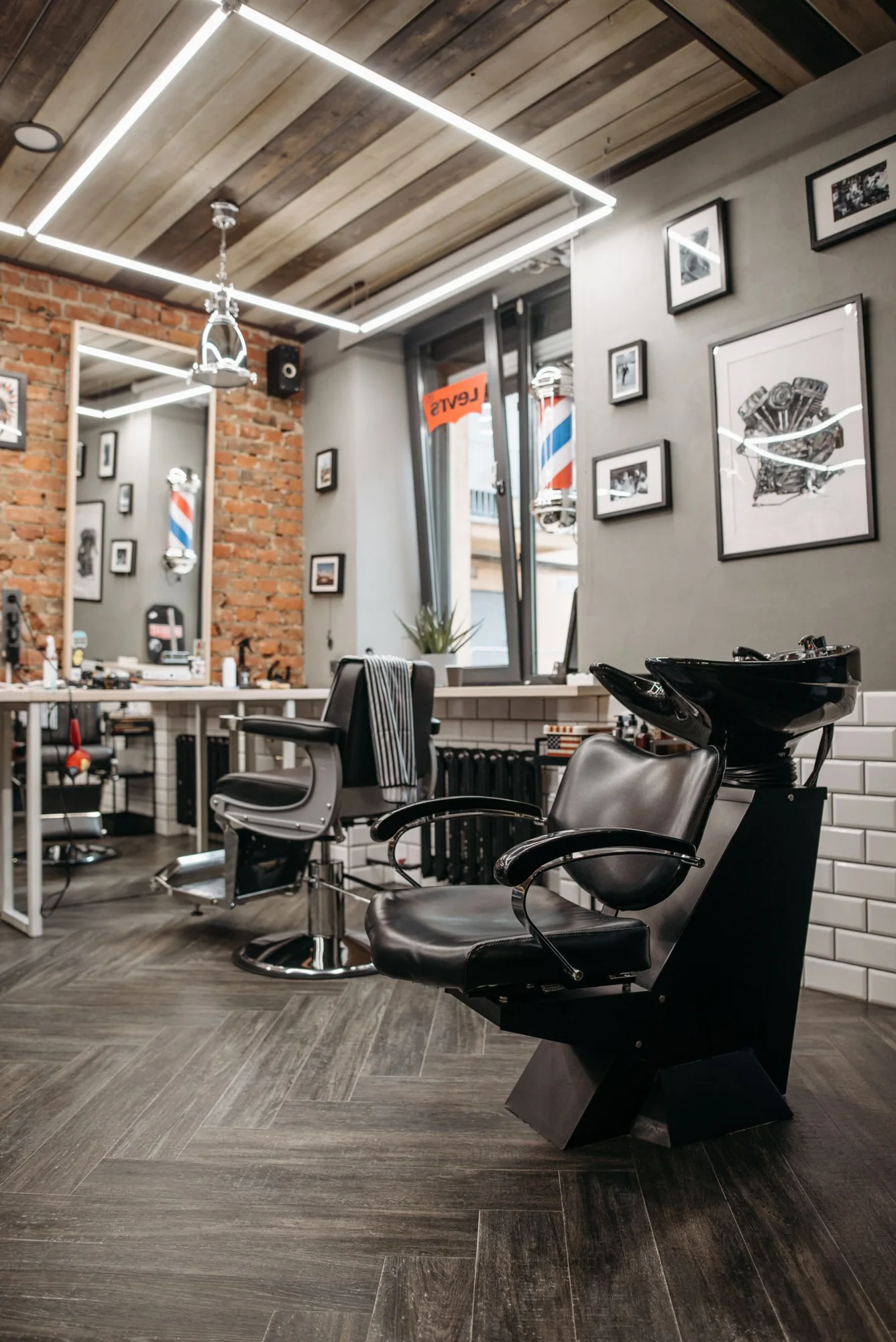 Contemporary barbershop interior with chairs and mirrors