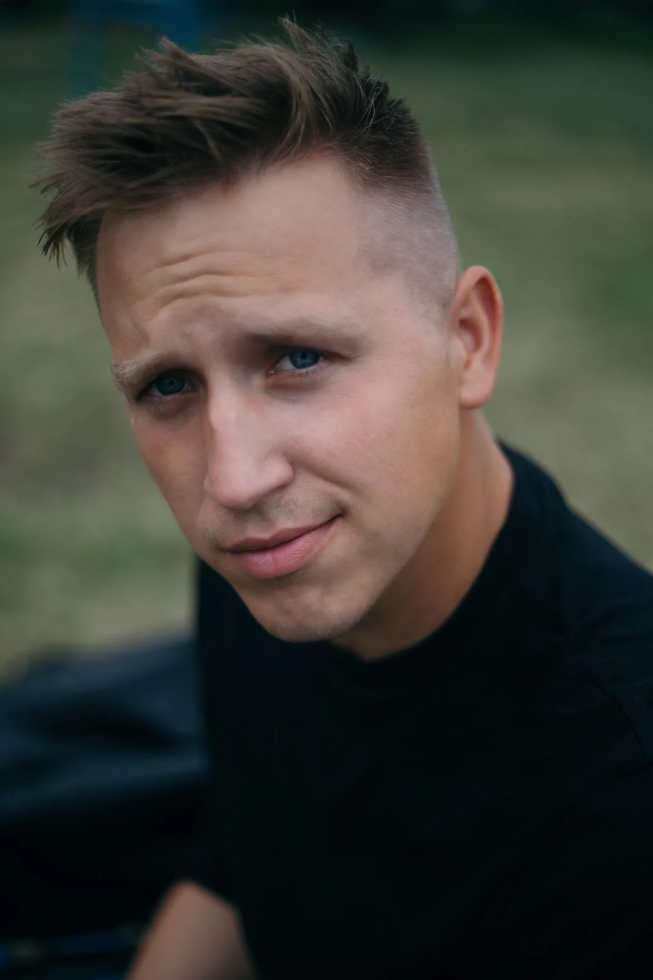 Portrait showing a short men’s hairstyle